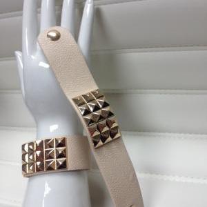 Cream With Gold Accents Thick Band Leather..